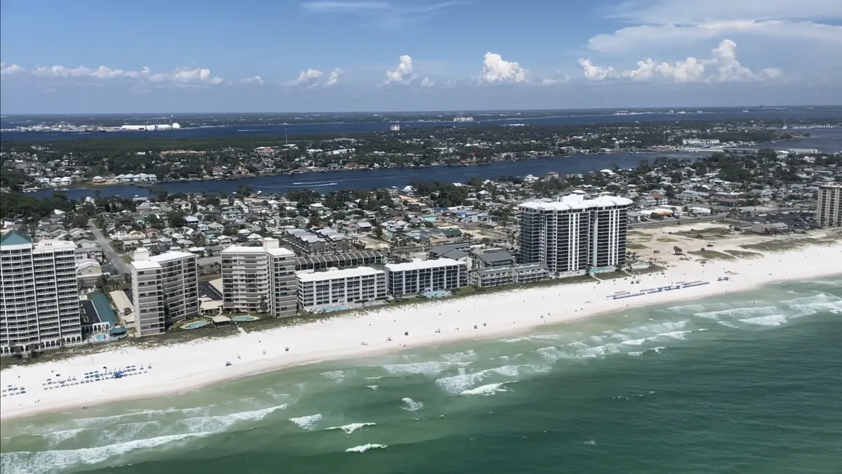 Panama City Beach Gulf Coast access with white sand, dune grass, and calm water