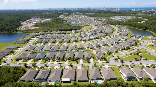 Panama City Florida residential area with trees, modest homes, and local streets